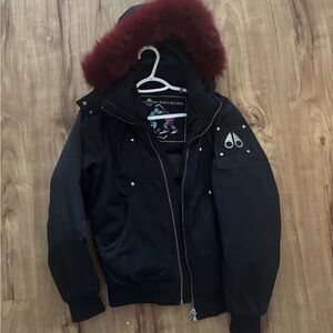 Moose Knuckles Black Puffer Jacket with Burgundy Fur Trim